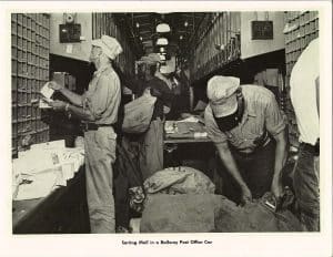 Sorting Mail in a Railway Post Office Car