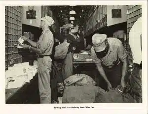 Sorting Mail in a Railway Post Office Car